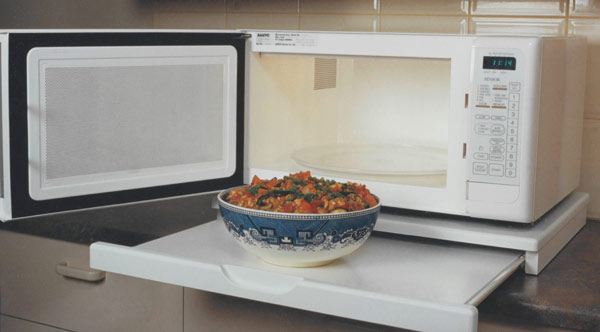 a Microwave Shelf, the Stealth Shelf with a White Closed Pull Out Shelf